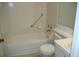 Clean bathroom with bathtub and toilet at 3161 Lake Pine S Way # B1, Tarpon Springs, FL 34688