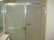 Clean bathroom with shower and grab bar at 3161 Lake Pine S Way # B1, Tarpon Springs, FL 34688