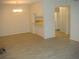 Dining room with kitchen pass-through and vinyl flooring at 3161 Lake Pine S Way # B1, Tarpon Springs, FL 34688