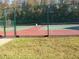 Two well-maintained tennis courts at 3161 Lake Pine S Way # B1, Tarpon Springs, FL 34688