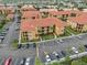 Aerial view of apartment complex with ample parking at 4305 Bayside Village Dr # 104, Tampa, FL 33615