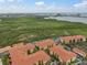 Aerial view of apartment buildings near waterfront at 4305 Bayside Village Dr # 104, Tampa, FL 33615