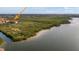 Aerial view of waterfront property with conservation area at 4305 Bayside Village Dr # 104, Tampa, FL 33615