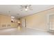 Open living room showcasing kitchen and access to other rooms at 4305 Bayside Village Dr # 104, Tampa, FL 33615