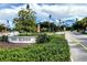 Entrance to Davis Islands, featuring lush landscaping and signage at 4305 Bayside Village Dr # 104, Tampa, FL 33615
