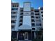 Condo building exterior with entrance and landscaping at 450 Treasure Island Cswy # 601, Treasure Island, FL 33706