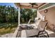 Relaxing patio with lounge chairs and a grill at 5944 Bay S Dr, Gulfport, FL 33707