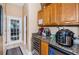 Wet bar with wine cooler and additional counter space at 5944 Bay S Dr, Gulfport, FL 33707
