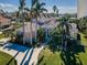 Beautiful home exterior with palm trees and landscaping at 5944 Bay S Dr, Gulfport, FL 33707
