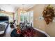 Bright breakfast nook with glass table and chairs, adjacent to kitchen at 5944 Bay S Dr, Gulfport, FL 33707