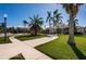 Stunning curb appeal with lush landscaping and driveway at 5944 Bay S Dr, Gulfport, FL 33707