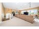 Spacious living room with sectional sofa and large windows at 5944 Bay S Dr, Gulfport, FL 33707