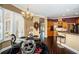 Kitchen breakfast nook with glass-top table and four chairs near kitchen at 5944 Bay S Dr, Gulfport, FL 33707