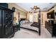 Spacious main bedroom with a post bed and plenty of natural light at 5944 Bay S Dr, Gulfport, FL 33707