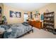 Bright bedroom featuring a large bed and ample closet space at 5944 Bay S Dr, Gulfport, FL 33707
