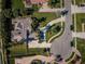 Luxury home with solar panels and circular driveway, bird's-eye view at 5944 Bay S Dr, Gulfport, FL 33707