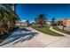Beautiful neighborhood with lush landscaping and palm trees at 5944 Bay S Dr, Gulfport, FL 33707