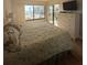 King-size bed in spacious bedroom with water views and access to balcony at 6268 Palma Del Mar Blvd S # 215, St Petersburg, FL 33715