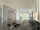 Modern kitchen with granite countertops and white cabinets at 6268 Palma Del Mar Blvd S # 215, St Petersburg, FL 33715