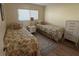 Guest bedroom with two twin beds and ample closet space at 6268 Palma Del Mar Blvd S # 215, St Petersburg, FL 33715