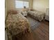 Guest bedroom with two twin beds and ample closet space at 6268 Palma Del Mar Blvd S # 215, St Petersburg, FL 33715