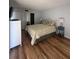 Main bedroom with king-size bed and private access to bathroom at 6268 Palma Del Mar Blvd S # 215, St Petersburg, FL 33715