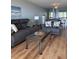 Spacious living room with comfy seating and a glass coffee table at 6268 Palma Del Mar Blvd S # 215, St Petersburg, FL 33715