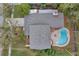 House with pool and backyard, seen from above at 8309 La Serena Dr, Tampa, FL 33614