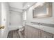 Clean bathroom, granite countertop, updated vanity at 8404 Millwood Dr, Hudson, FL 34667