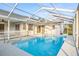 Refreshing screened pool, ready for summer fun at 8404 Millwood Dr, Hudson, FL 34667