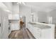 Kitchen boasts white cabinets, granite countertops and appliances at 8404 Millwood Dr, Hudson, FL 34667