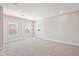 Spacious bedroom featuring neutral paint, plush carpet, recessed lighting, and bright natural light at 17525 Glistening Ct, Venice, FL 34293