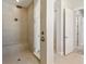 Modern tile shower with a built-in bench and glass enclosure at 17525 Glistening Ct, Venice, FL 34293