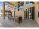 Spacious patio with seating area and access to pool and outdoor kitchen at 1858 Longview Ln, Tarpon Springs, FL 34689