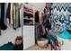Large walk-in closet with ample shelving and hanging space at 1858 Longview Ln, Tarpon Springs, FL 34689