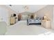 Bright Primary bedroom with ample space and large windows at 1858 Longview Ln, Tarpon Springs, FL 34689