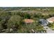 Aerial view showcasing the house's location and surrounding neighborhood at 1858 Longview Ln, Tarpon Springs, FL 34689