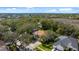 House's street view shown in this overhead image, highlighting its curb appeal at 1858 Longview Ln, Tarpon Springs, FL 34689