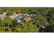 High-angle view of house and neighborhood, showcasing the property's surroundings at 1858 Longview Ln, Tarpon Springs, FL 34689