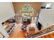 High-ceiling living room with hardwood floors and access to a pool at 1858 Longview Ln, Tarpon Springs, FL 34689