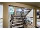 Exterior stairwell with bikes parked nearby at 220 Woodlake Wynde # 220, Oldsmar, FL 34677