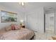 Bedroom with a queen-size bed and ample closet space at 2516 Roberta St, Largo, FL 33771