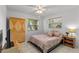 Bedroom with a queen-size bed and built-in wardrobe at 2516 Roberta St, Largo, FL 33771