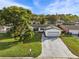 Aerial view of a single Gathering home with a large yard at 2516 Roberta St, Largo, FL 33771