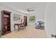 Home office with built-in shelving and desk at 2516 Roberta St, Largo, FL 33771
