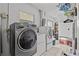 Laundry room with washer, dryer, and storage at 2516 Roberta St, Largo, FL 33771