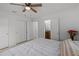 Bedroom with a queen bed and access to a full bathroom at 2516 Roberta St, Largo, FL 33771