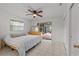 Bedroom with a queen-size bed and access to the patio at 2516 Roberta St, Largo, FL 33771