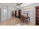 Bright home office with built-in shelving and desk at 2516 Roberta St, Largo, FL 33771