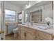 Bathroom with walk-in shower and updated vanity at 2516 Roberta St, Largo, FL 33771